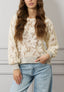 Maglia in pizzo bordi lurex