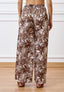 Pantalone palazzo con stampa palme - MARRONE