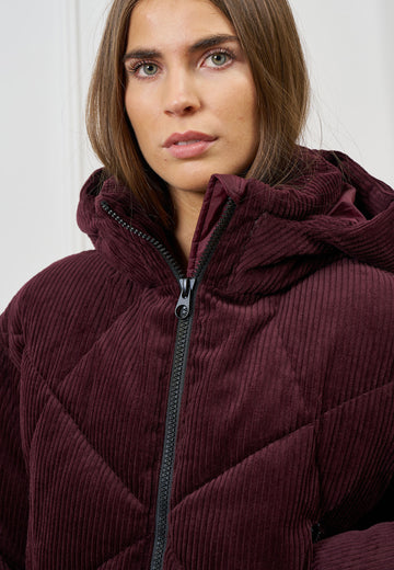 Piumino corto in velluto a coste