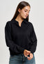 Maglia polo con spalla scesa - NERO