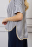 T-shirt over righe spalla scesa