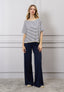 T-shirt over righe spalla scesa