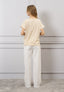 T-shirt righe scollo in lurex