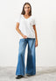 T-shirt scollo a v con spacchetti fondo