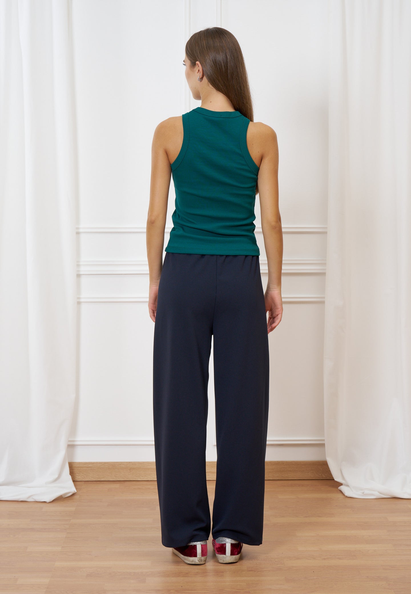 Top a costine aderente