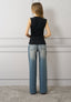 Top collo asimmetrico