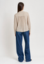 Blusa a pois con faldone davanti - AVORIO