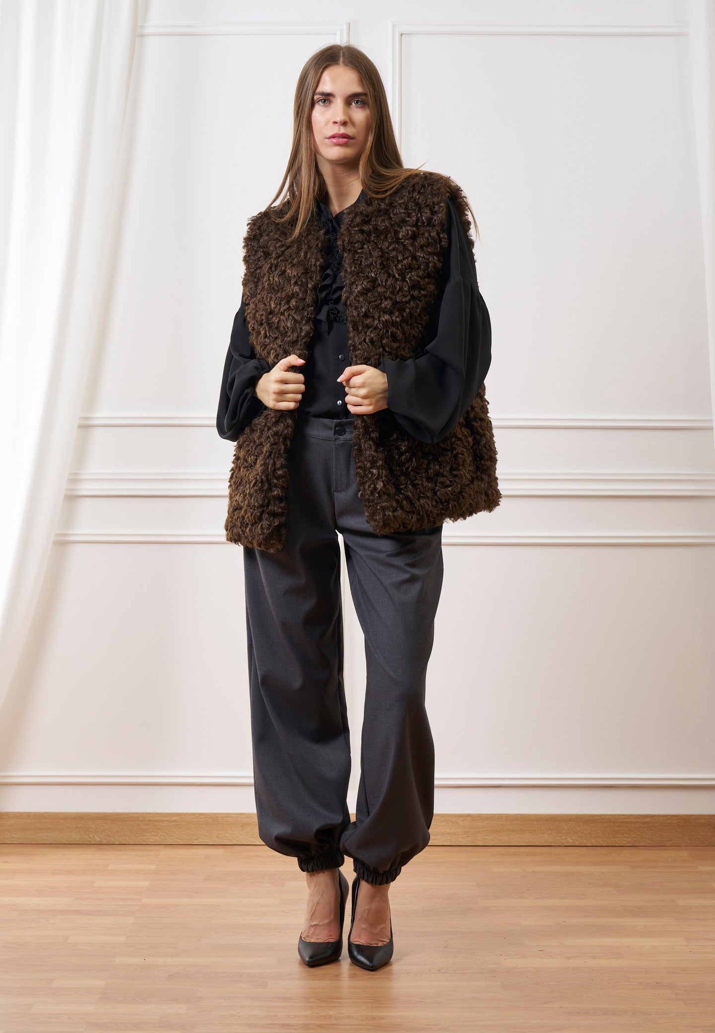 Cappotto smanicato in ecopelliccia