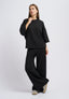 Maglia ampia a costine con lurex - NERO