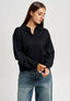 Maglia polo con spalla scesa - NERO