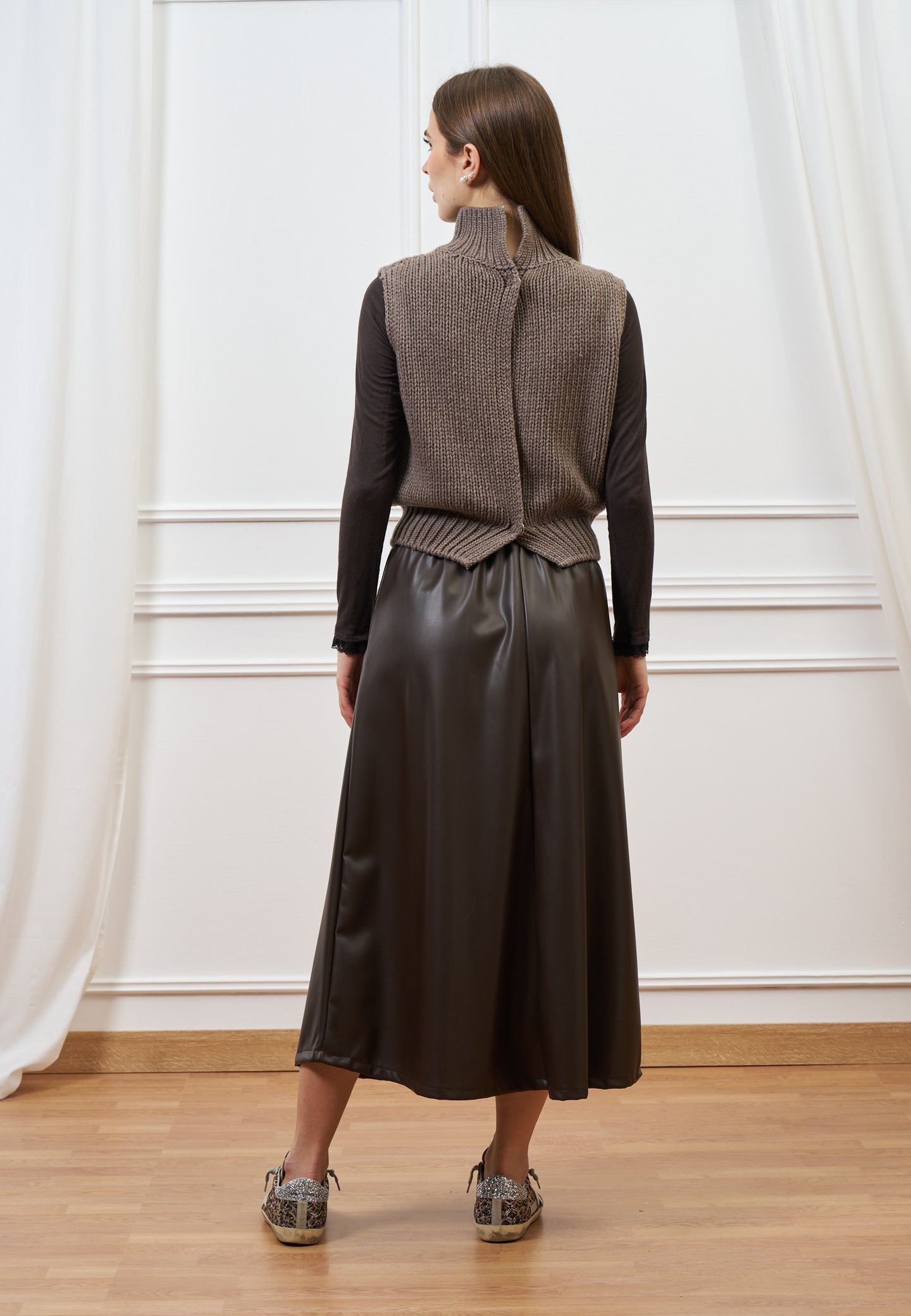 Maglia smanicata apertura sul retro