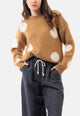    maglione-a-pois-con-spalla-scesa